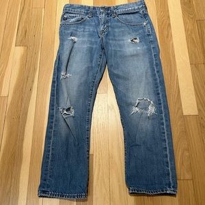 AG ripped blue jeans